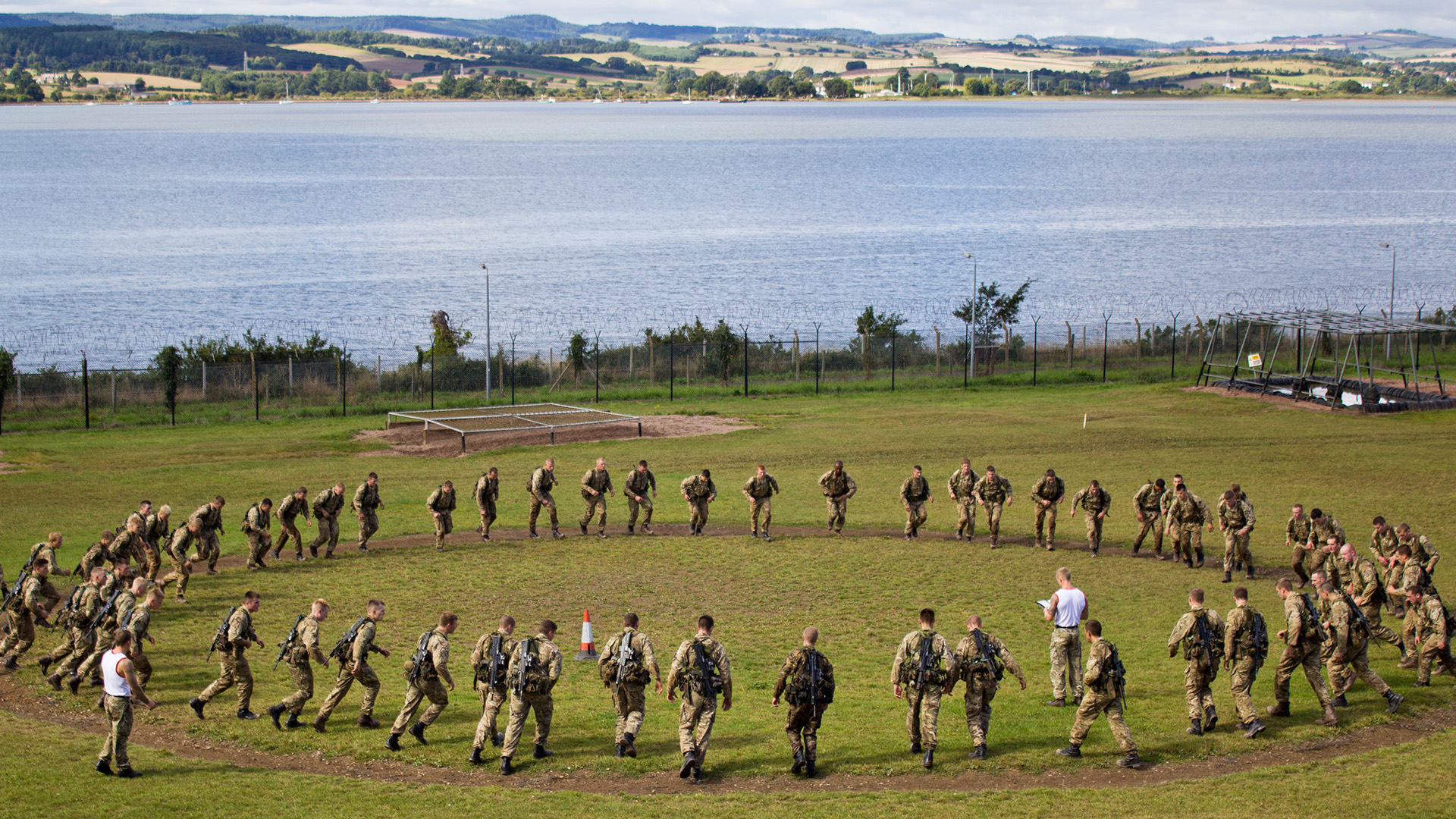 Royal Marine Commando recruits complete assault course training at Lympstone in Devon