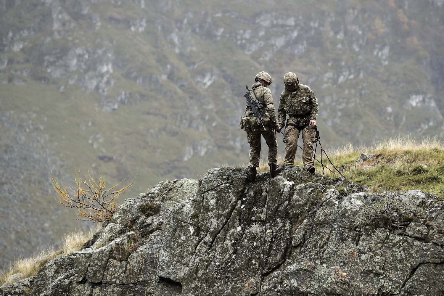 Cover image: Royal Marines train in the Scottish Highlands (Picture: Royal Navy).