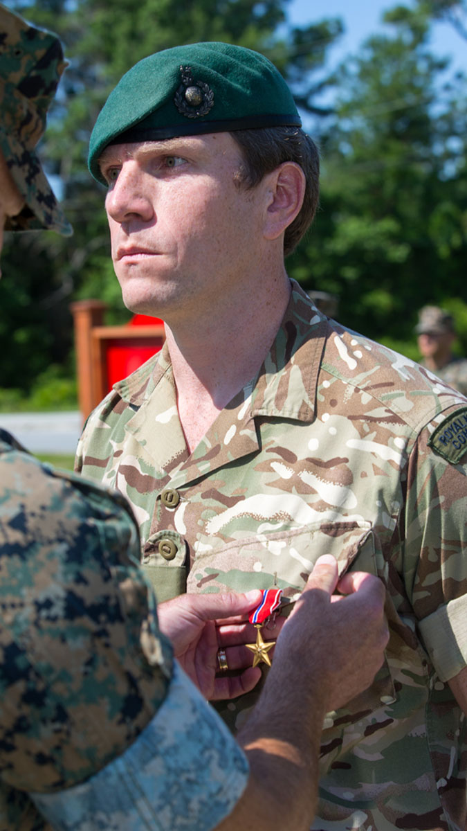 Major Fuller receives the Bronze Star (Picture: Royal Navy).