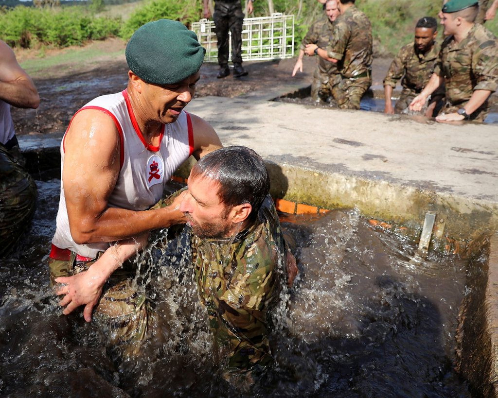 Royal Marine Scotty Mills and Gareth Southgate during 'sheep dip' 020617 CREDIT MOD.jpeg