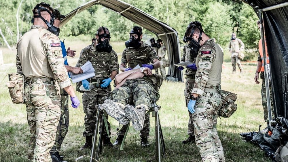 Royal Marines assessing a casualty during Royal Navy NATO exercise 05082022 CREDIT Royal Navy.jpg
