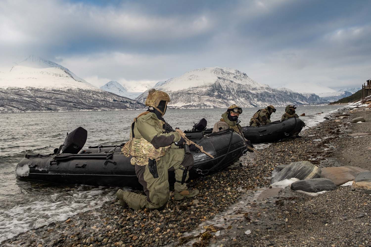 The squadron's Shore Reconnaissance Team assess the surroundings of an Arctic fjord (Picture: Royal Navy).