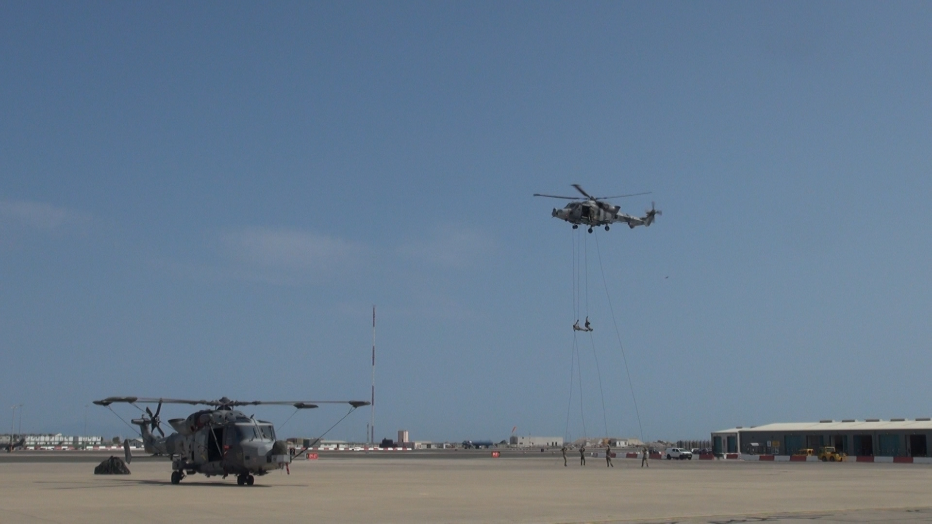 Royal Marines from 42 Commando practice abseiling at RAF Gibraltar.