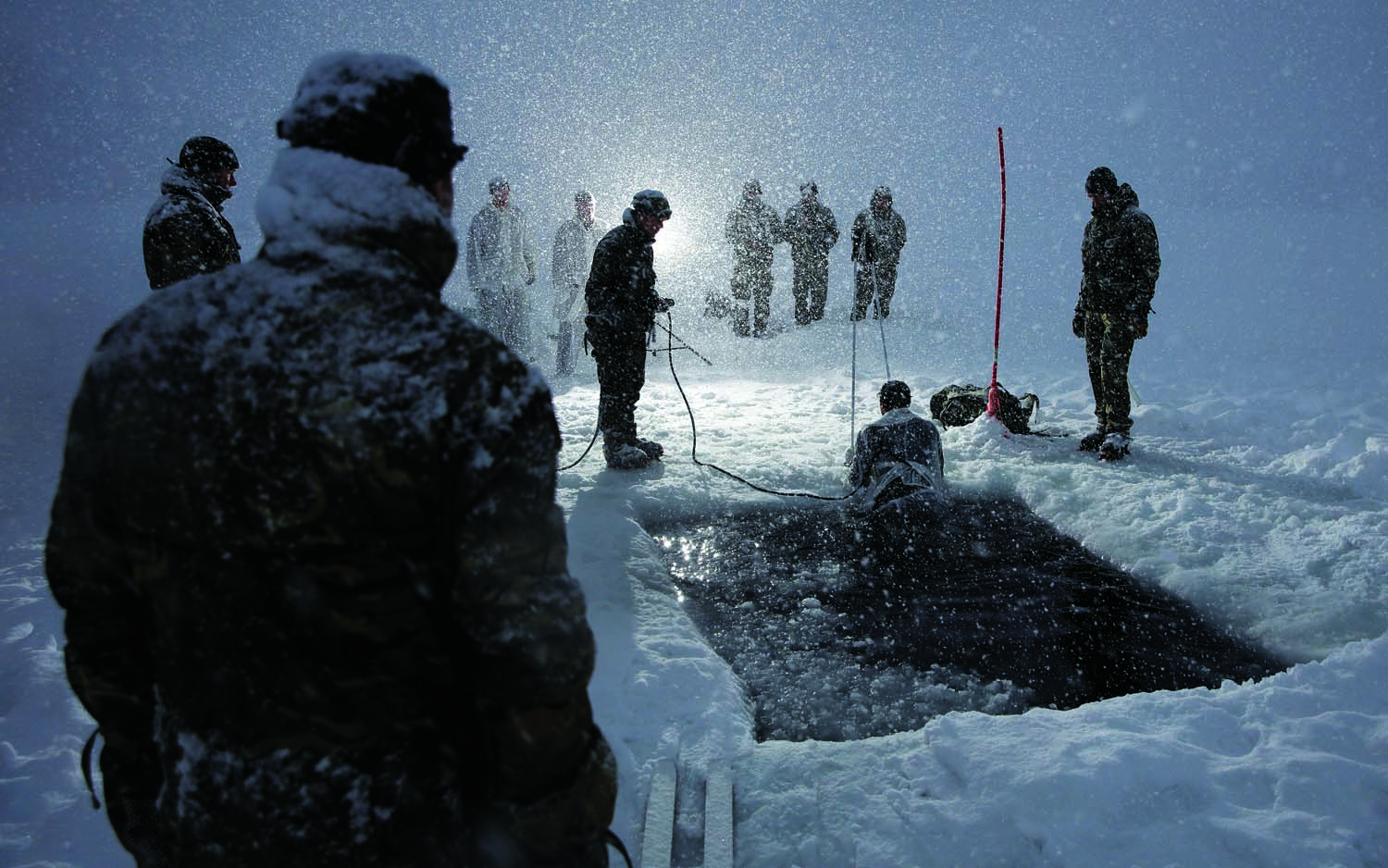 Personnel take part in an infamous ice-breaking drill (Picture: Royal Navy).