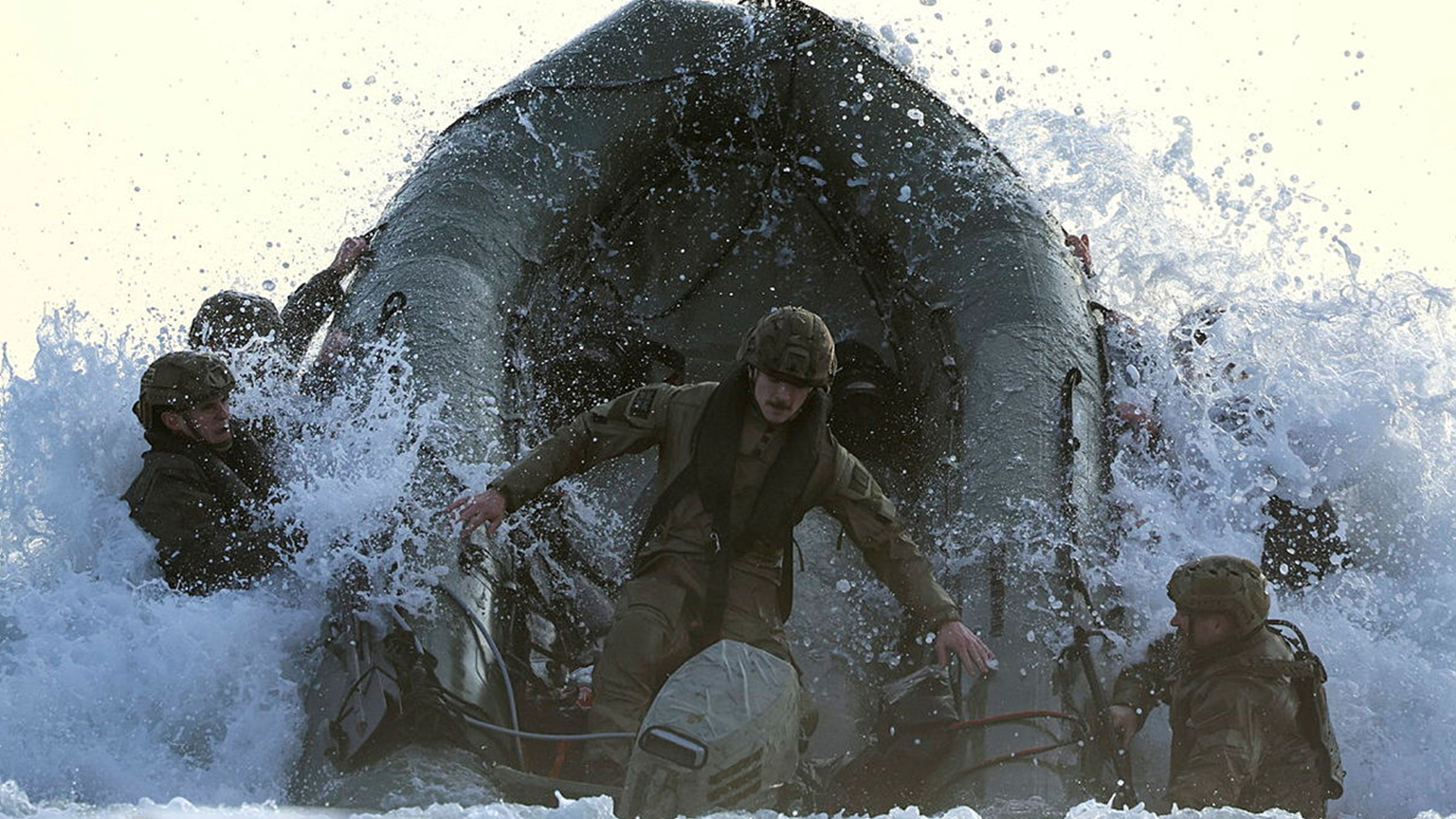 Royal Marines operate a Rigid Hull Inflatable Boat on Tregantle Beach