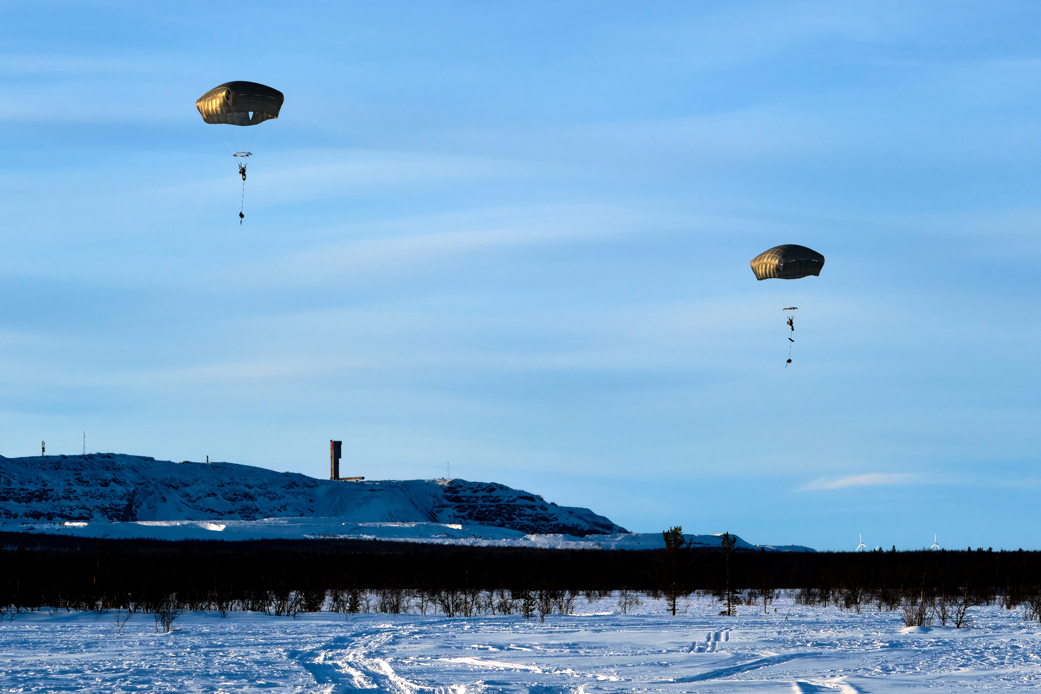 Cover Image: Royal Marines parachute on Exercise Cold Response (Picture: MOD).