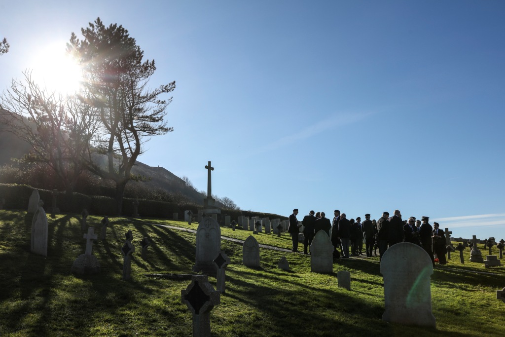 Japanese Defence attaché to the UK and Portland Royal Naval association attend service at Royal Navy Cemetery in Portland Dorset