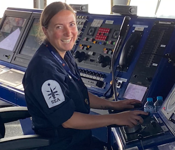 Royal Navy Reservist Zoe Bryant Helmsman Driving the ship DATE UNKNOWN CREDIT Zoe Bryant (2).PNG