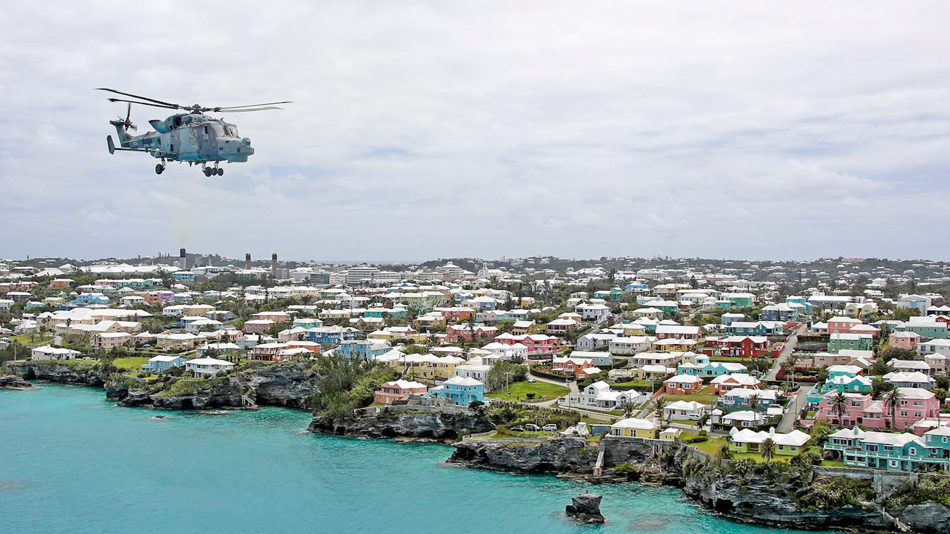 Cover image: Wildcat helicopter flies over Bermuda (Picture: Royal Navy).