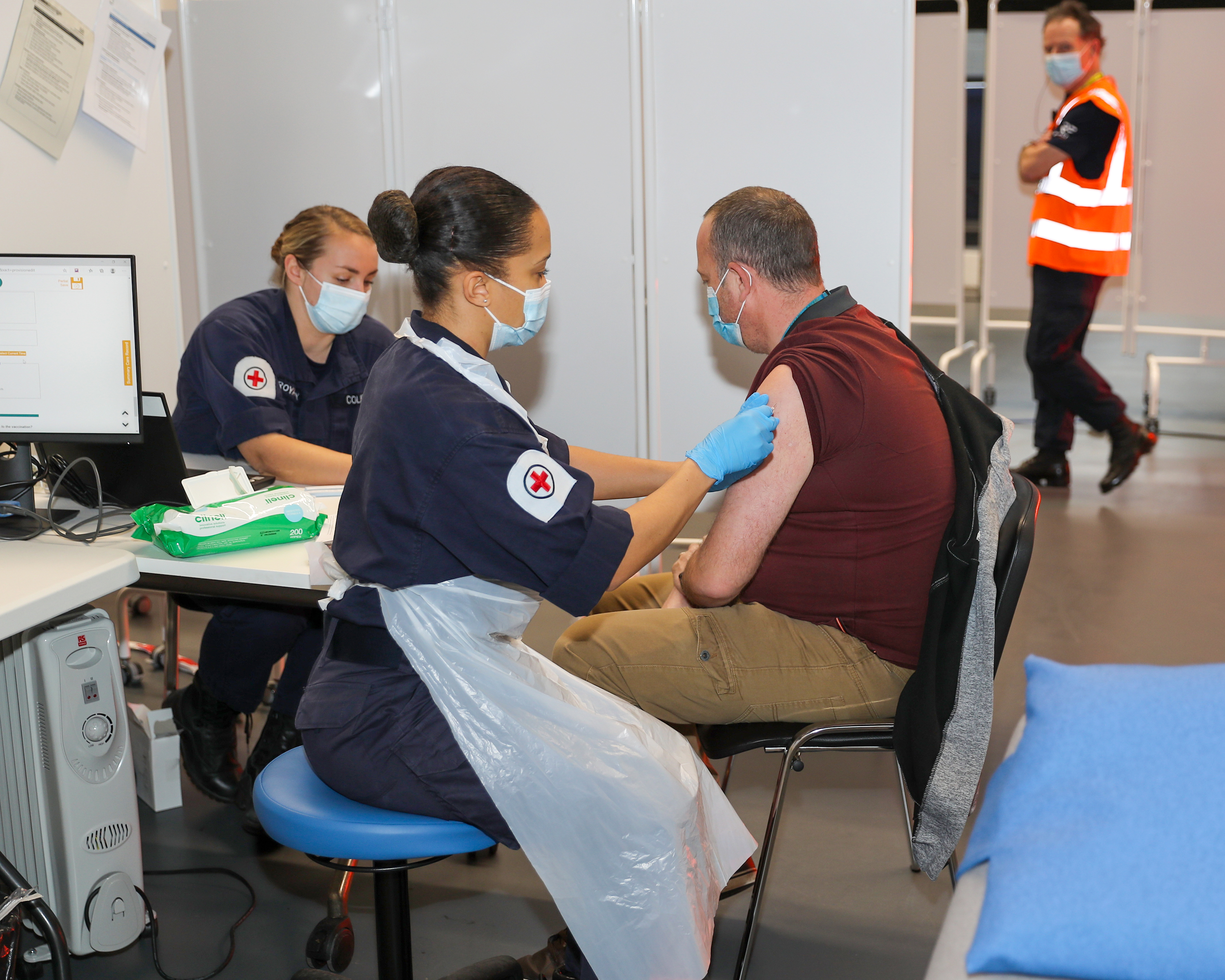 Royal Navy medics give the coronavirus vaccine to people in Bristol (Picture: Crown Copyright).