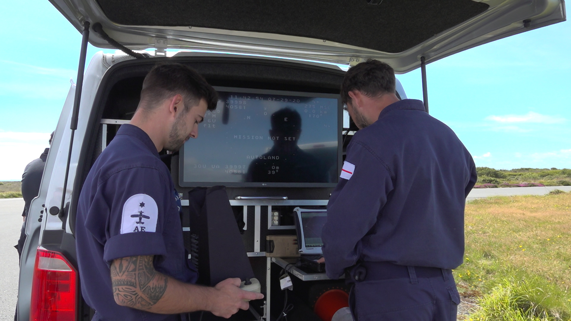 Royal Navy personnel fly a Puma drone and carry out data analysis of information captured from it.