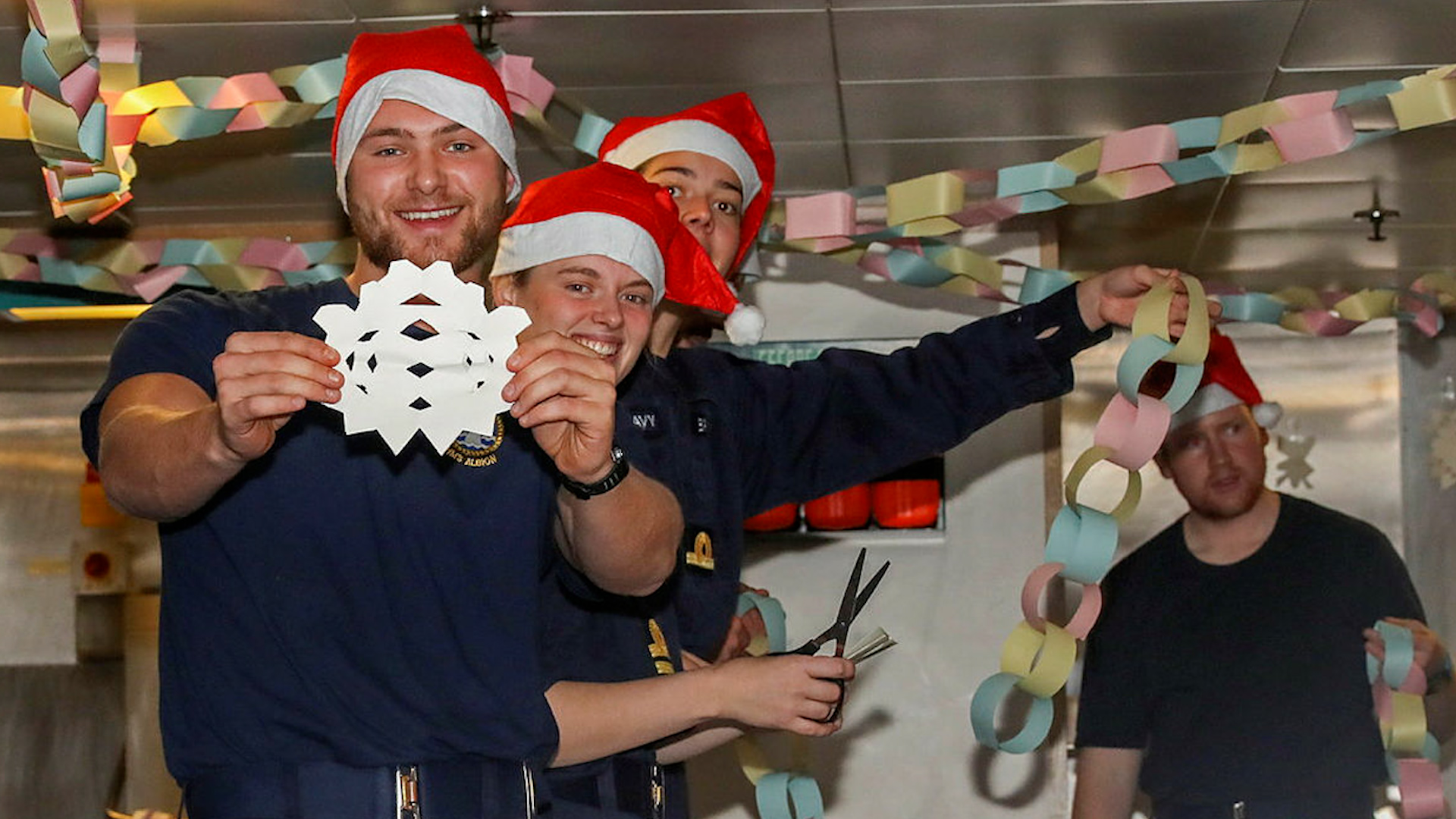 Royal Navy personnel on HMS Albion having Christmas dinner 120220 CREDIT MOD