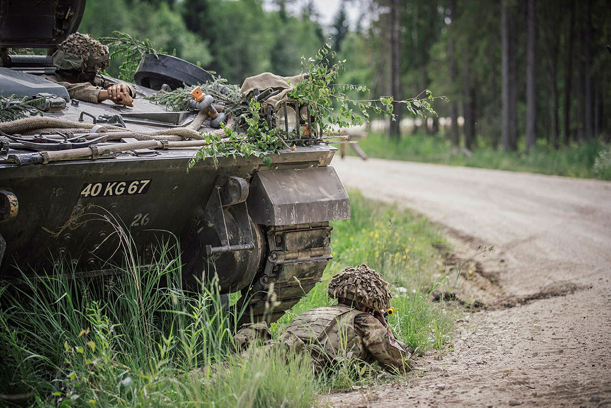 Members of the Royal Welsh Regiment beside a Warrior Infantry Fighting Vehicle during Exercise Saber Strike in Estonia in 2018 (picture: MOD)
