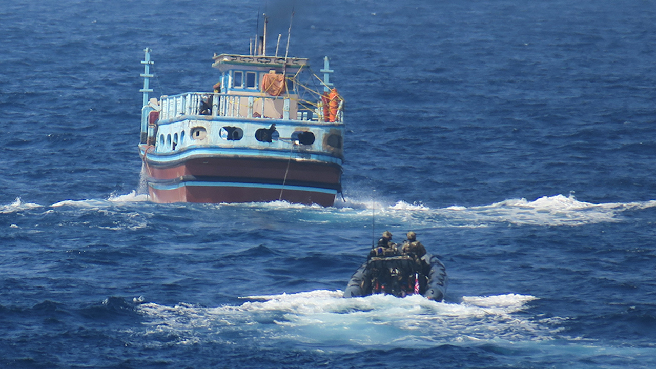 Royal Marines approaching the suspected boat in the Arabian Sea (Picture: Royal Navy).