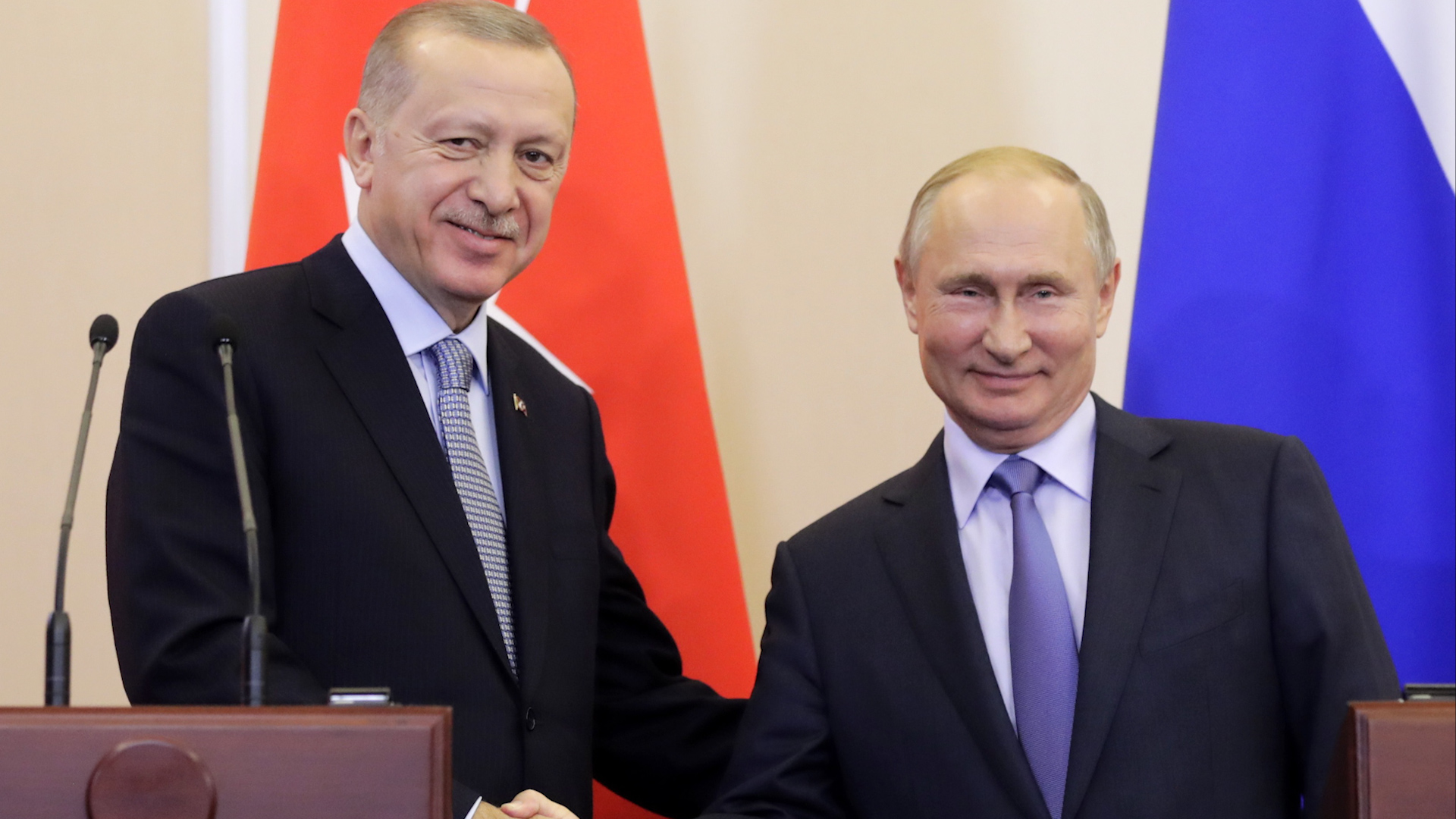Russian President Vladimir Putin shakes hands with Turkish President Recep Tayyip Erdoğan (Picture: PA).