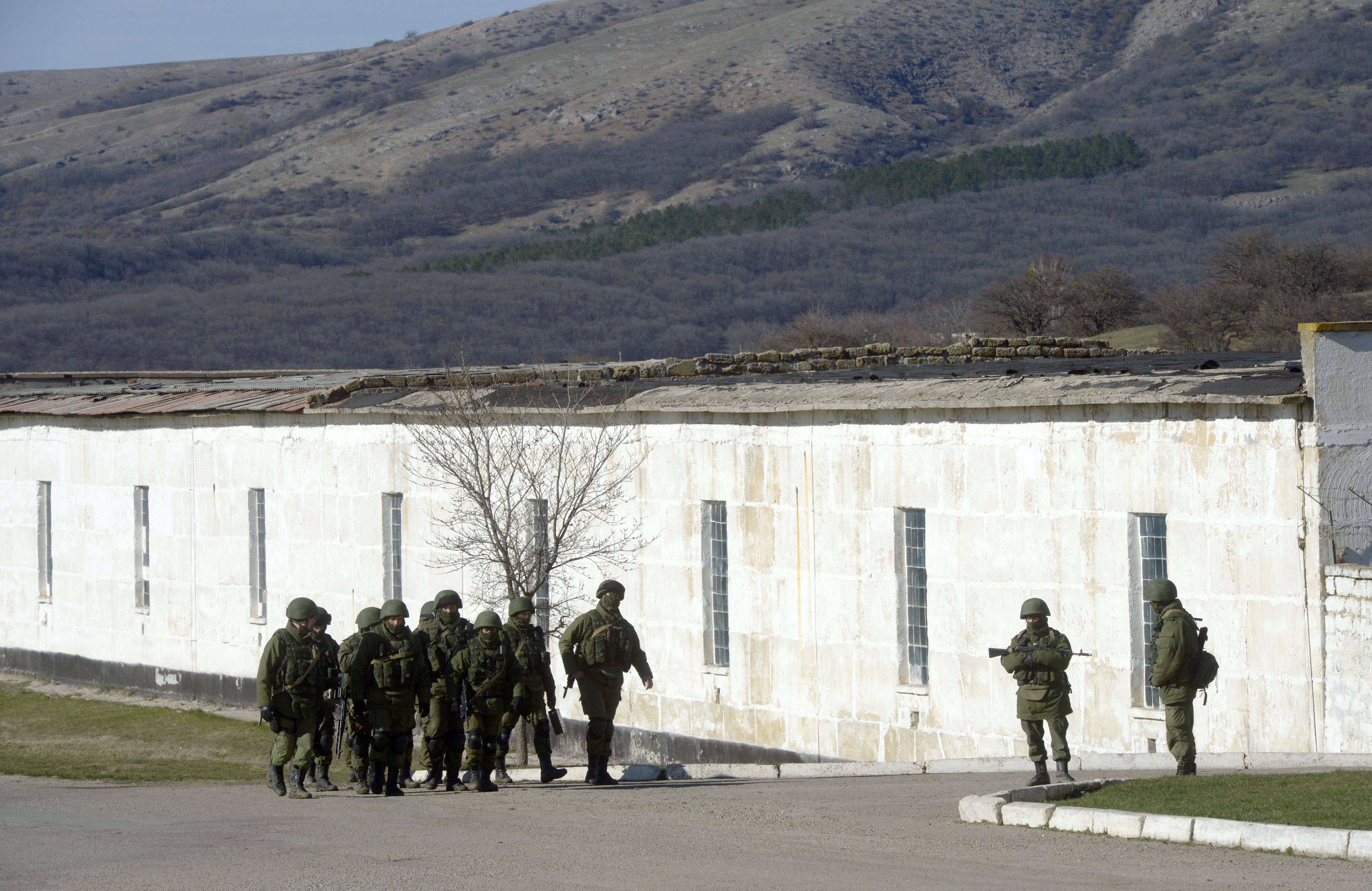 Russian troops outside Perevalnoye military base in Crimea