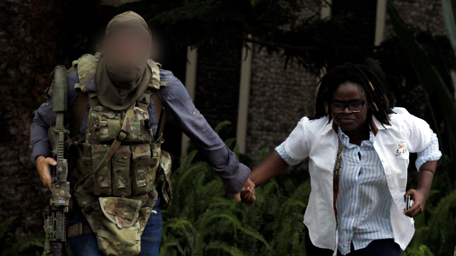 The soldier was spotted by locals standing by (Picture: Reuters).