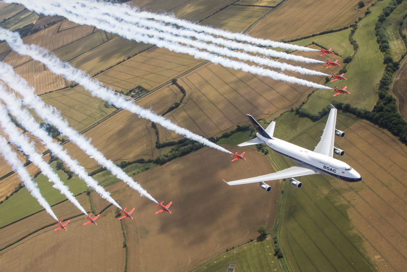 the Royal Air Force Aerobatic team, the Red Arrows and a British Airways Boeing 747, seen here carrying out a flypast over the Royal International Air Tattoo at RAF Fairford. Crown Copyright