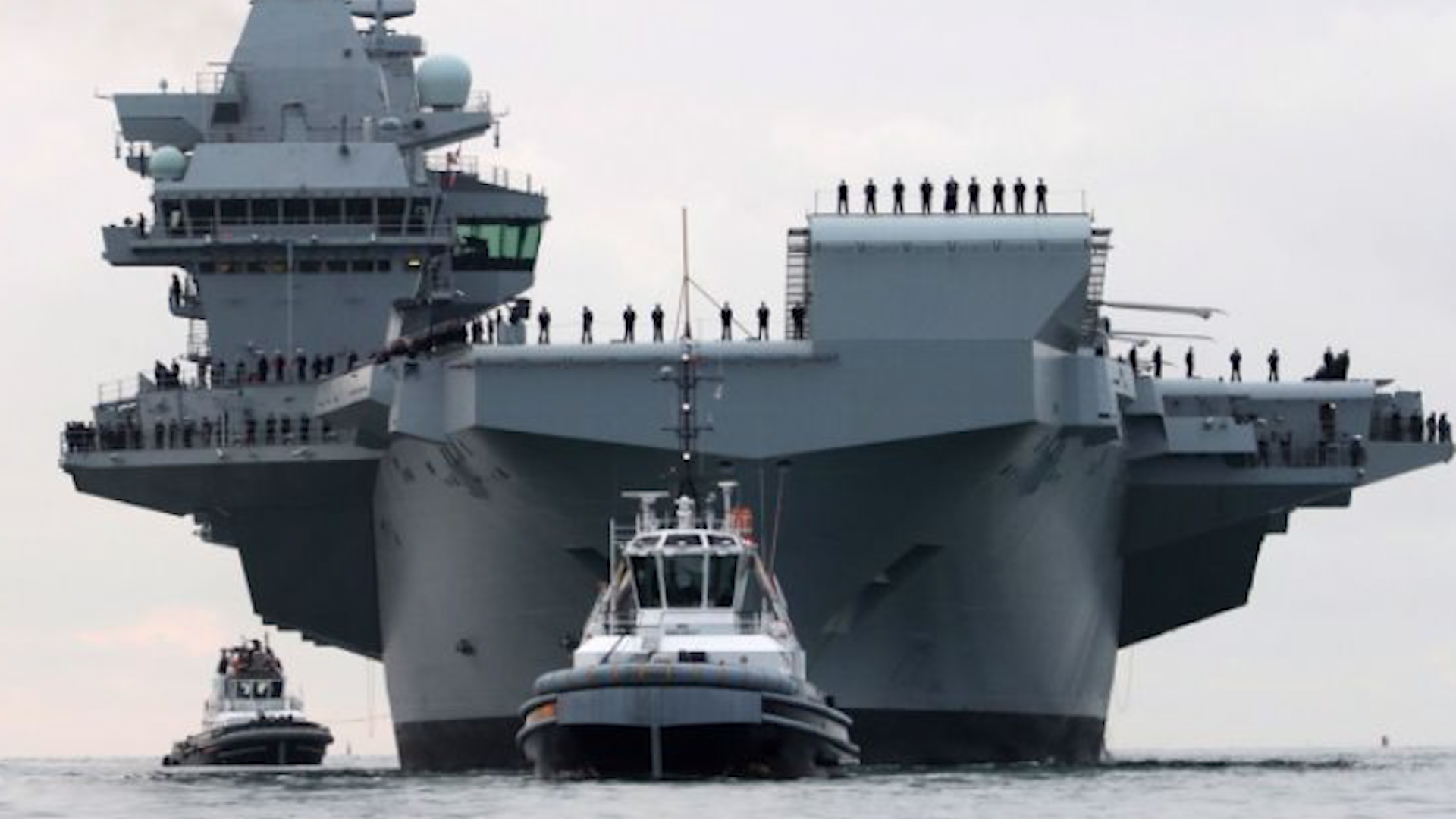 SD Tempest guiding HMS Queen Elizabeth back to port in 2017.