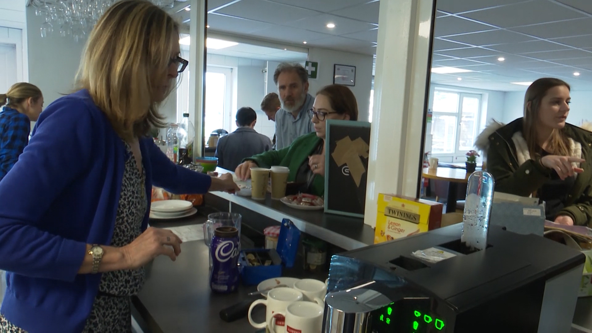 Volunteers open a coffee shop several times a week.