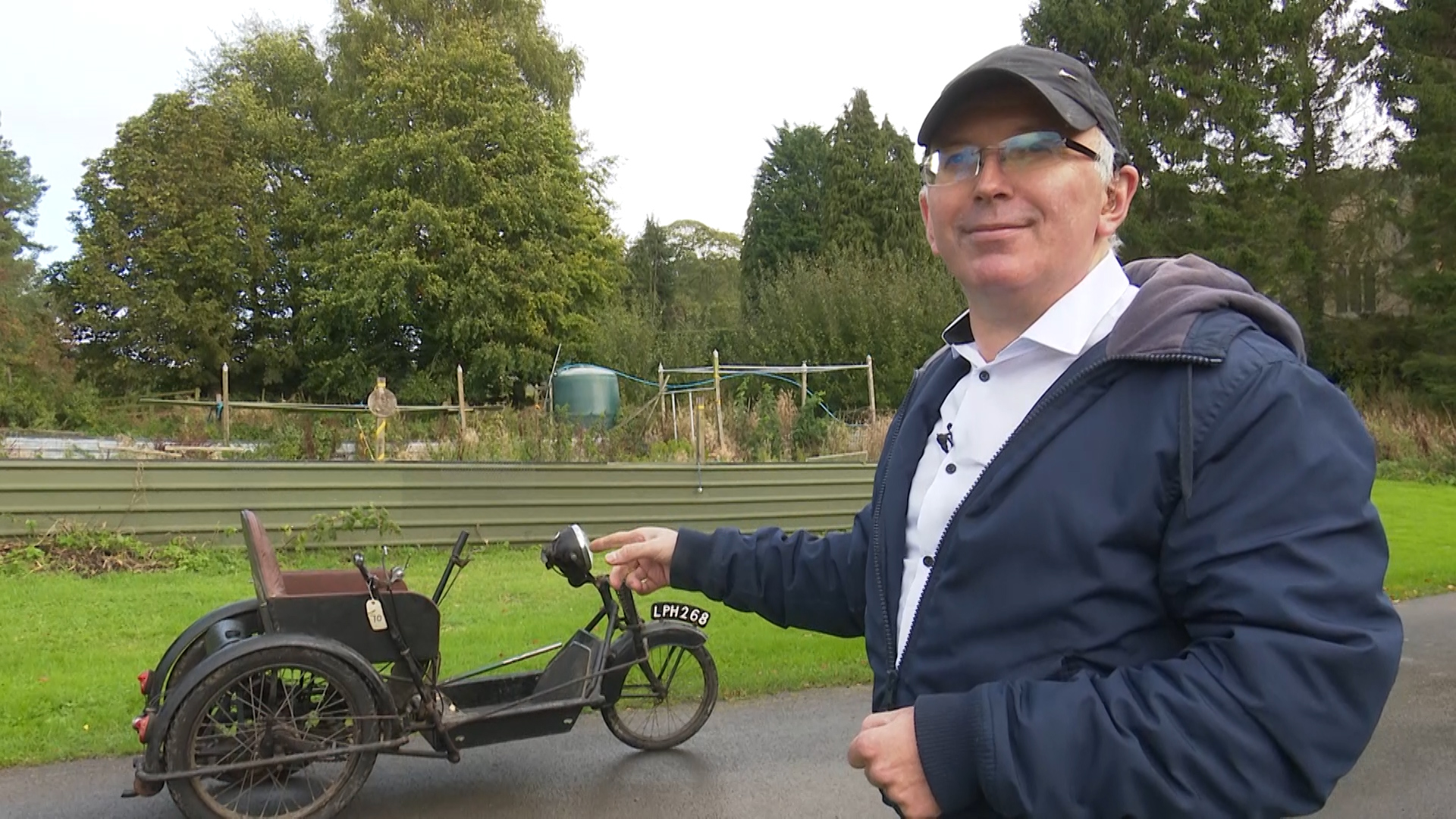 Simon McKeown Pointing At Invalid Carriage