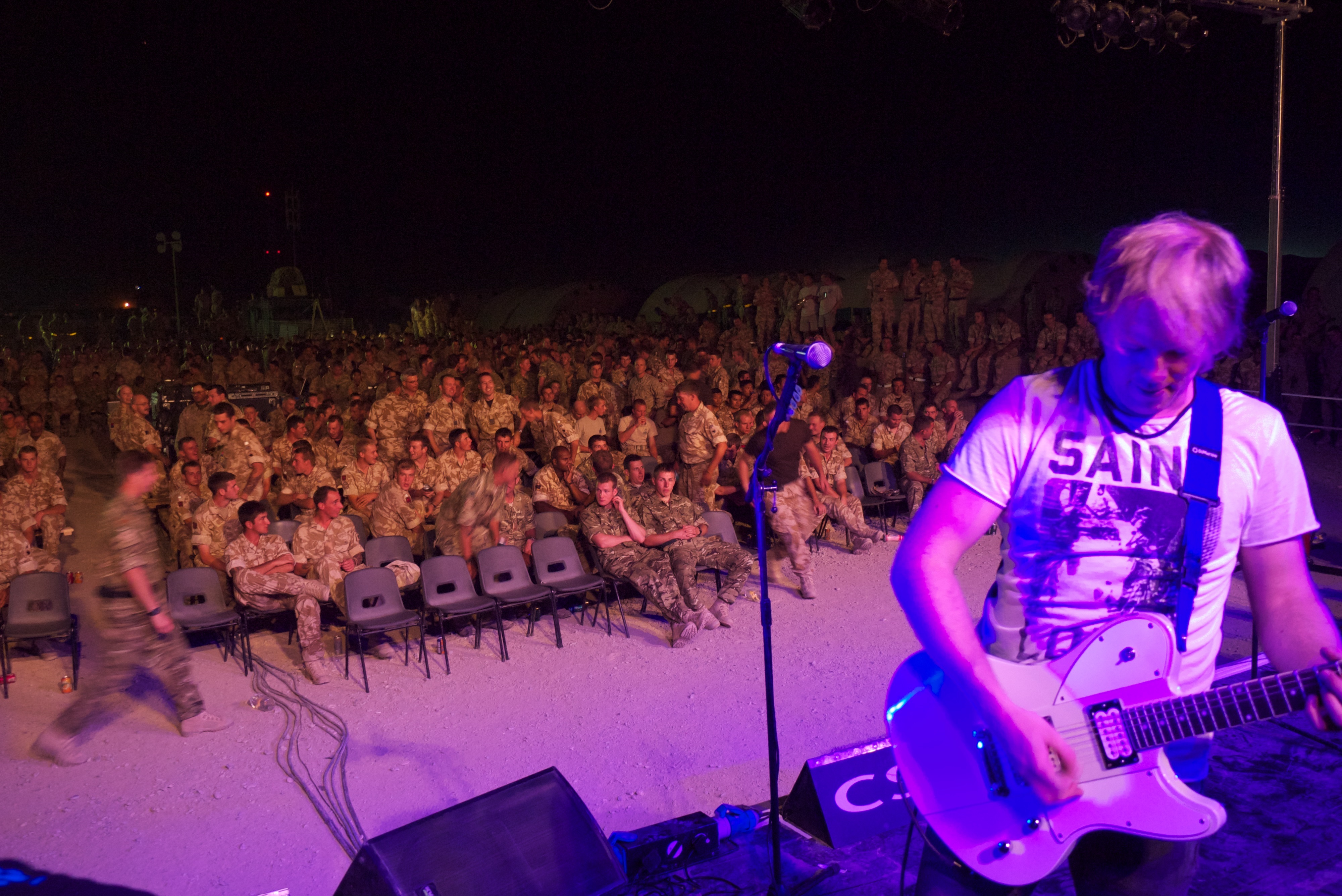 Sam Wilcock entertaining British Forces in Afghanistan