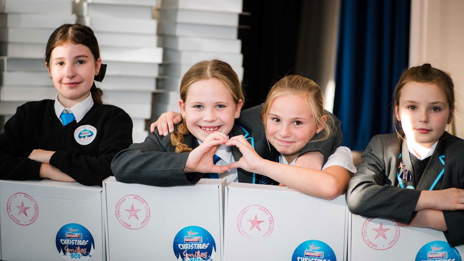 School children from Bovington School help with Christmas Smiles packing CREDIT Deborah Johnson