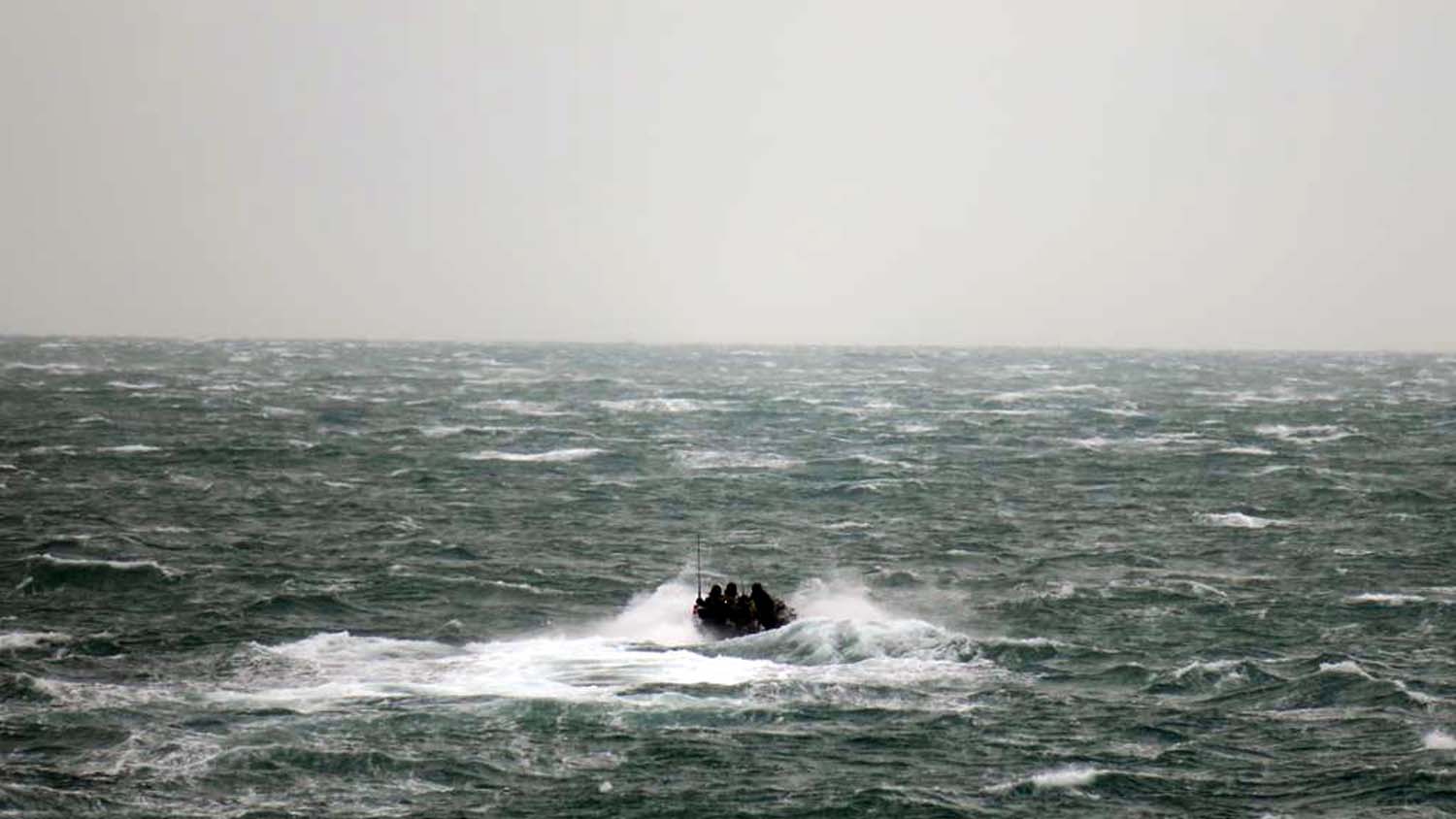 Seaboat launched from HMS Duncan to help a yacht in the English Channel
