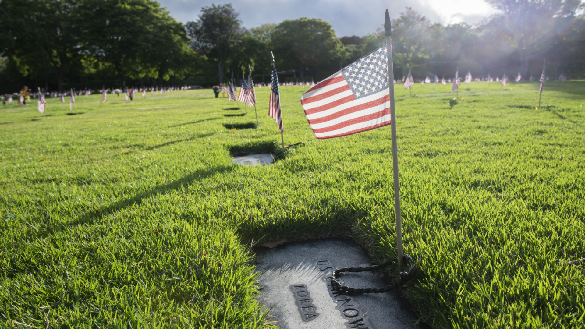 US flags over un known soldier's tomb from the Korean War at the National Memorial Cemetery of the Pacific in Honolulu, Hawaii. (Pictures: PA Images)