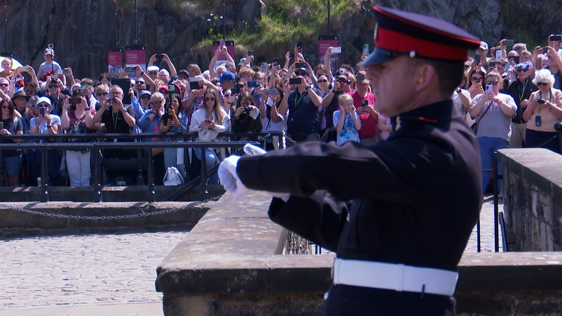 Sergeant Dave Beveridge District Gunner at Edinburgh Castle checks timing 15062023 CREDIT BFBS