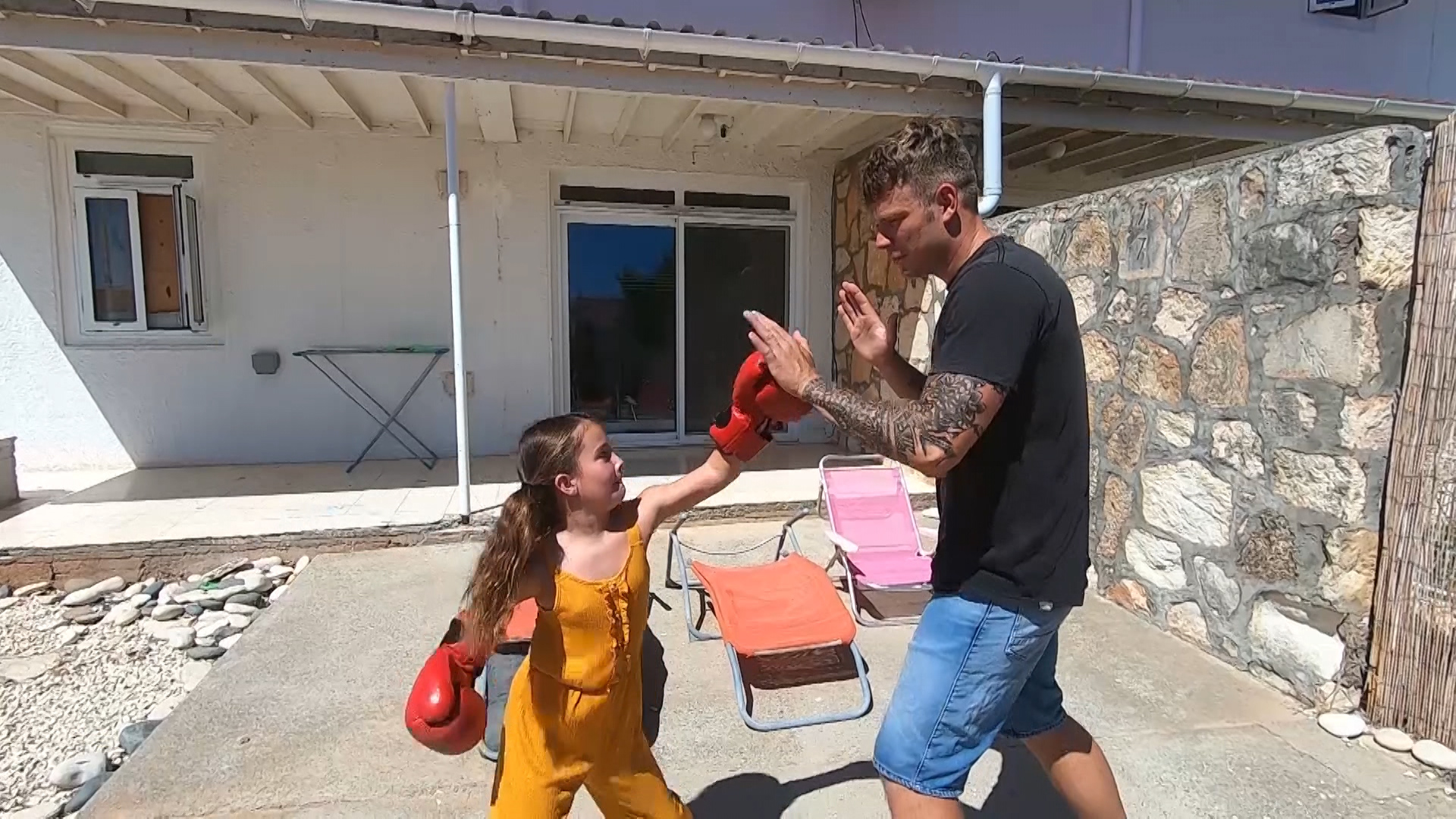 Sergeant Hallam playing at home with his daughter.