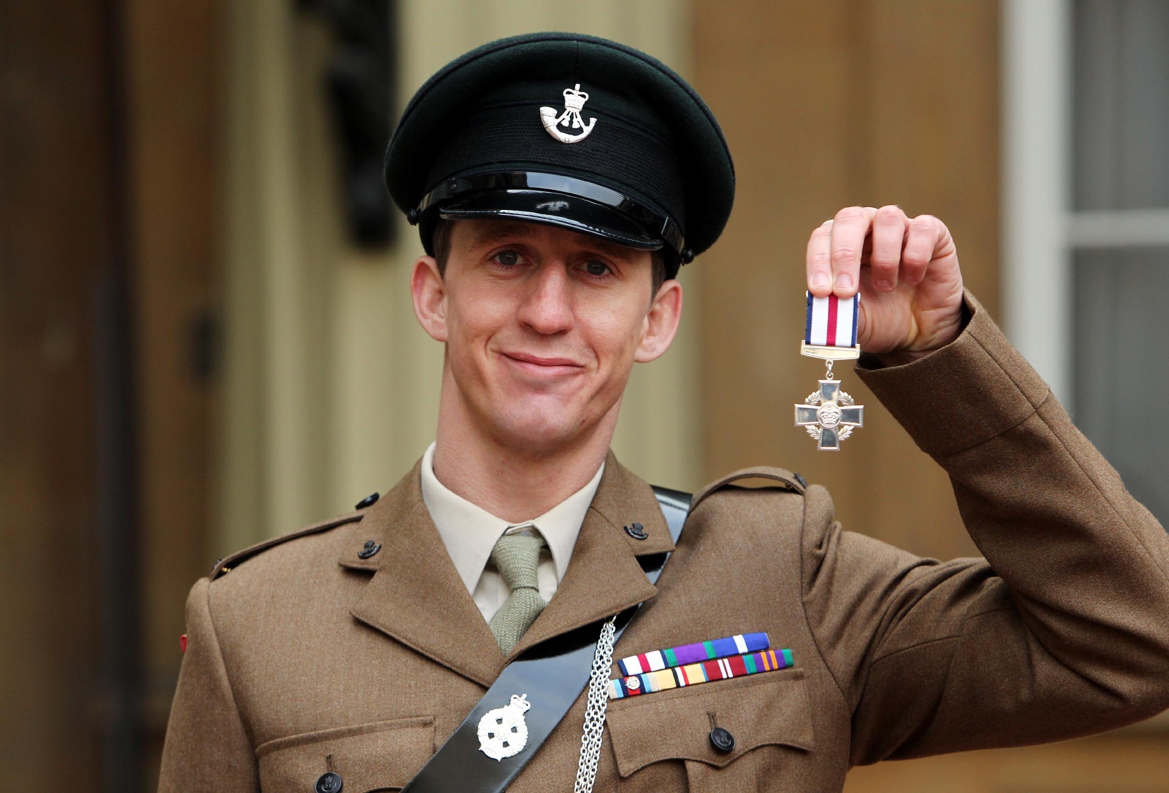Serjeant Deacon Cutterham with his Conspicuous Gallantry Cross medal following a ceremony at Buckingham Palace (Picture: PA).