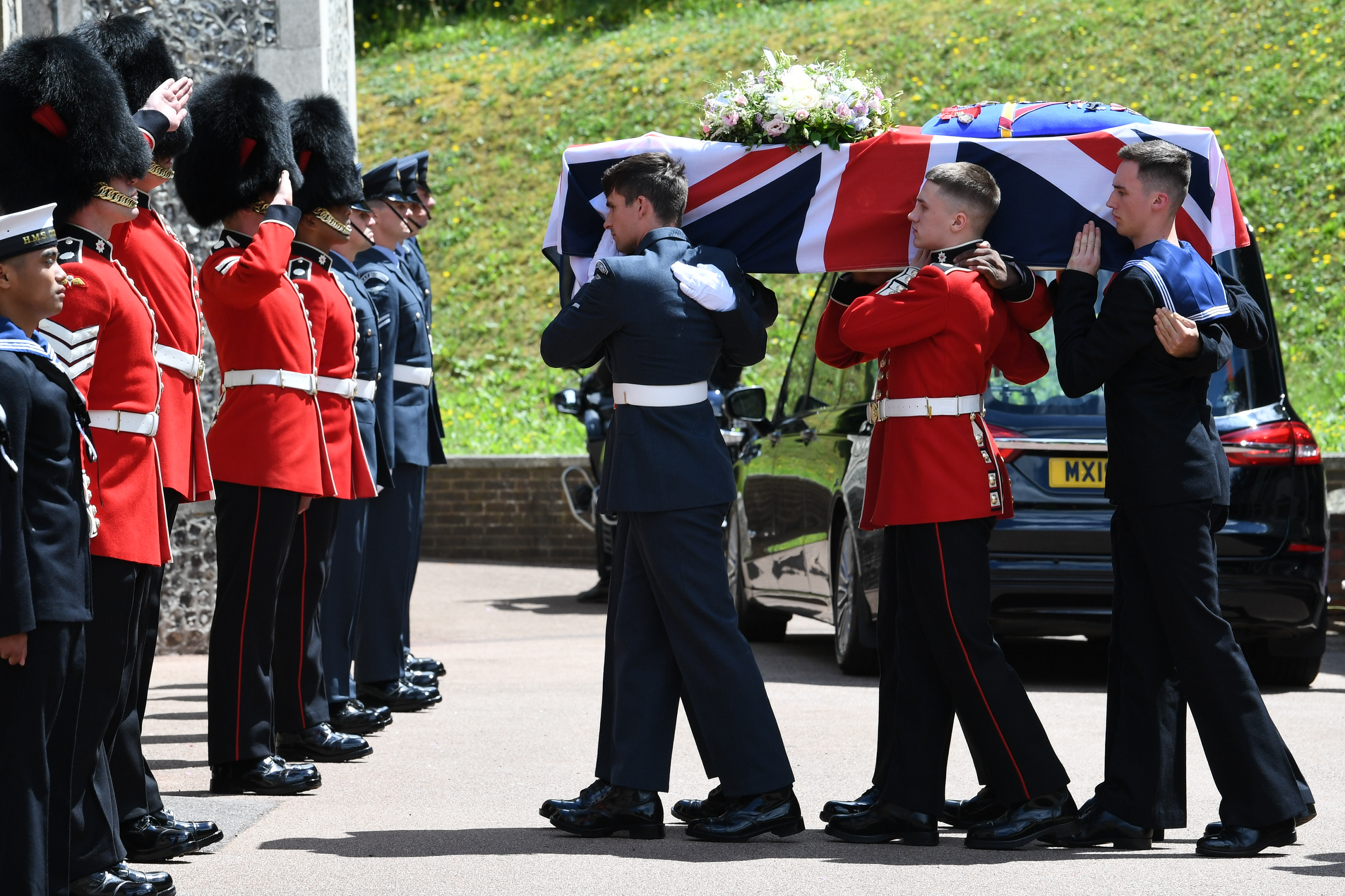 Service personnel carry the coffin of forces sweetheart Dame Vera Lynn into the Brighton Crematorium, East Sussex