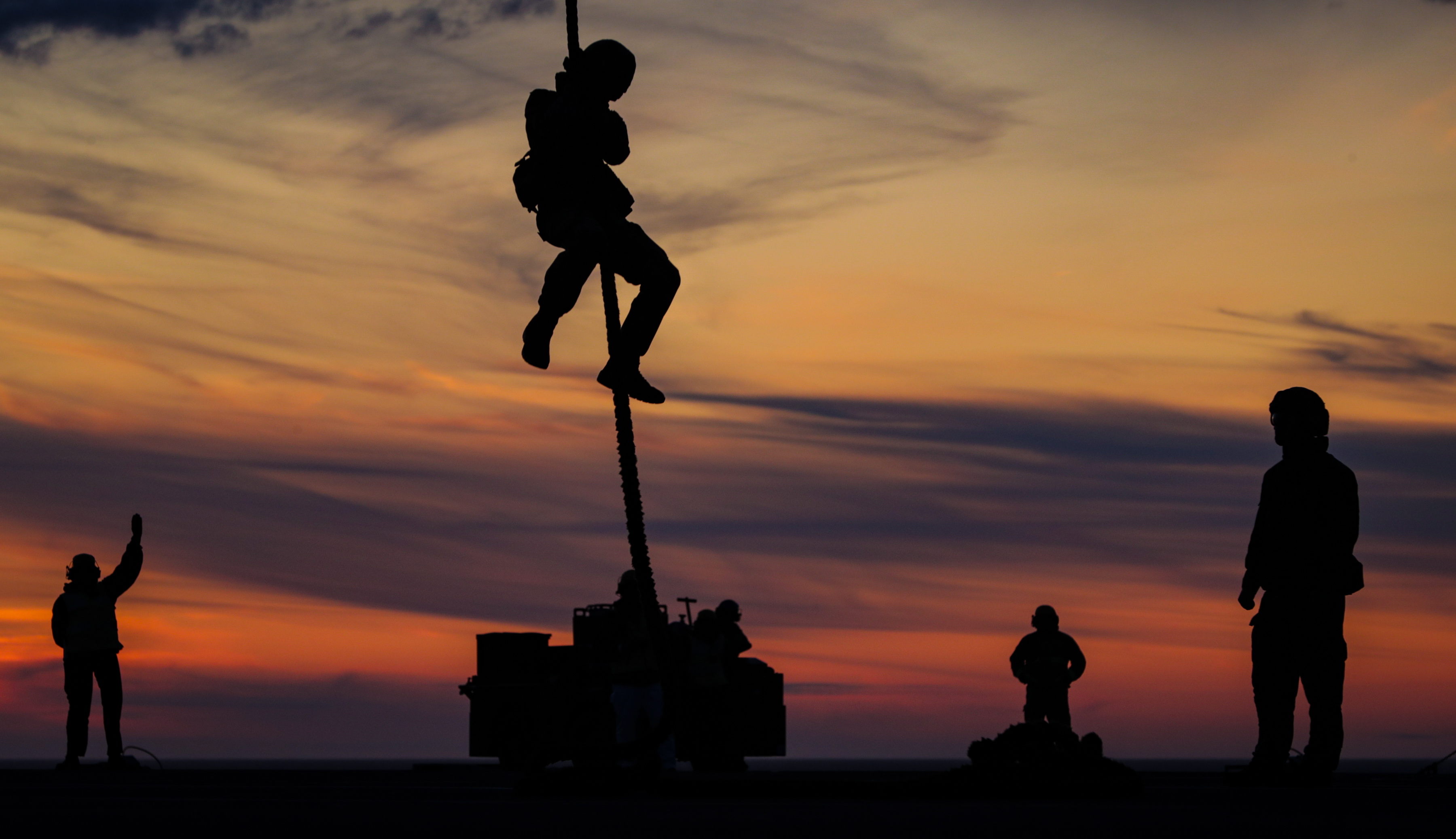 Royal Marines from Lima Company 42 Commando doing fast rope training (Picture: Royal Navy).