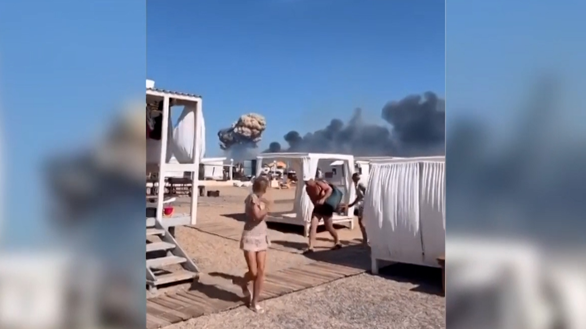 Smoke plume after a series of explosions that rocked Russia’s largest airbases in Crimea 11082022 CREDIT Eyepress, Reuters