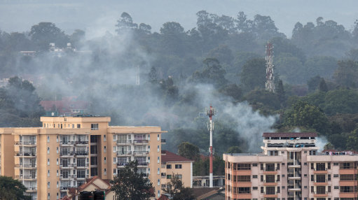 Smoke rises from the blast area after an attack at an upmarket hotel and office complex in Nairobi 150119 Credit PA.jpg