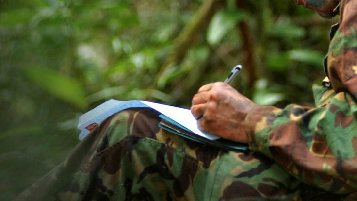 Soldier writes a Bluey in 2002 British Army Training Support Unit Belize BATSUB Jungle Training Crown Copyright
