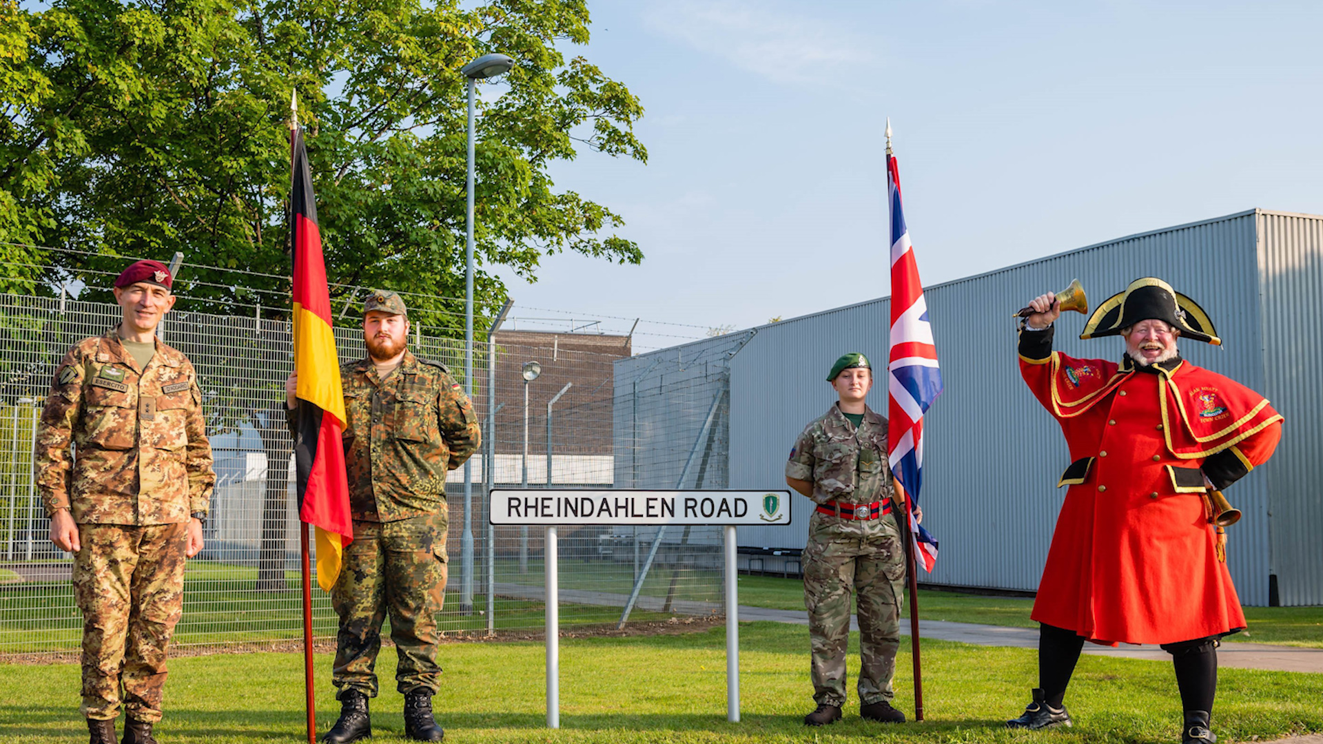 Personnel and a crier pictured at celebrations to mark 10 years of ARRC in Gloucestershire (Picture: NATO).
