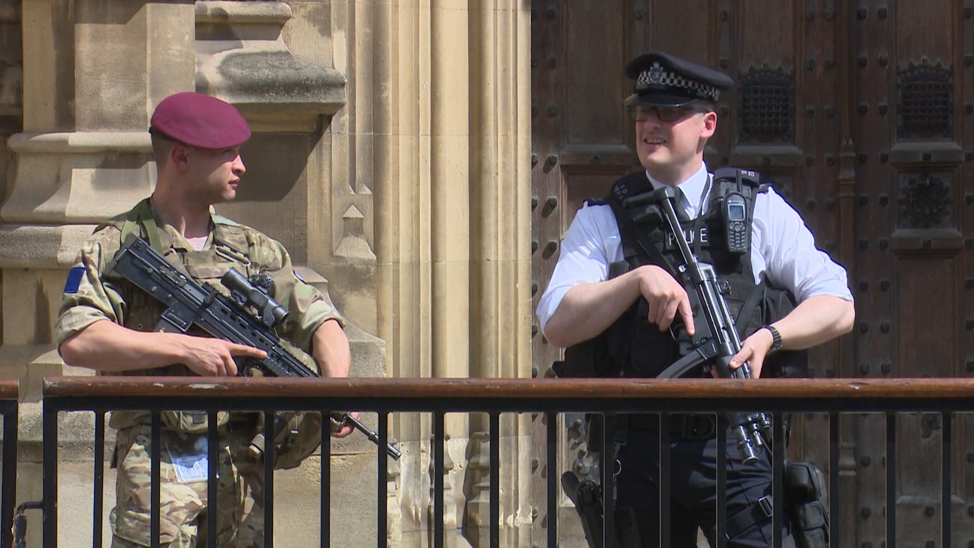 Armed Soldier and Policeman guard Parliament