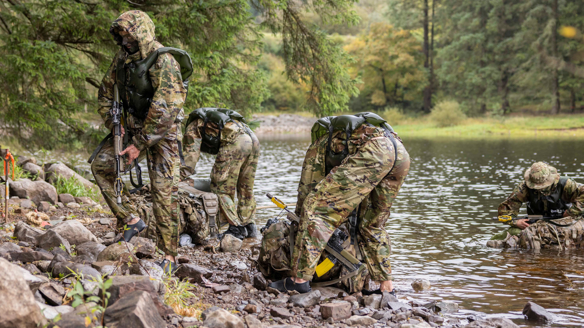 US Army soldiers carry out a river crossing during Exercise Cambian Patrol