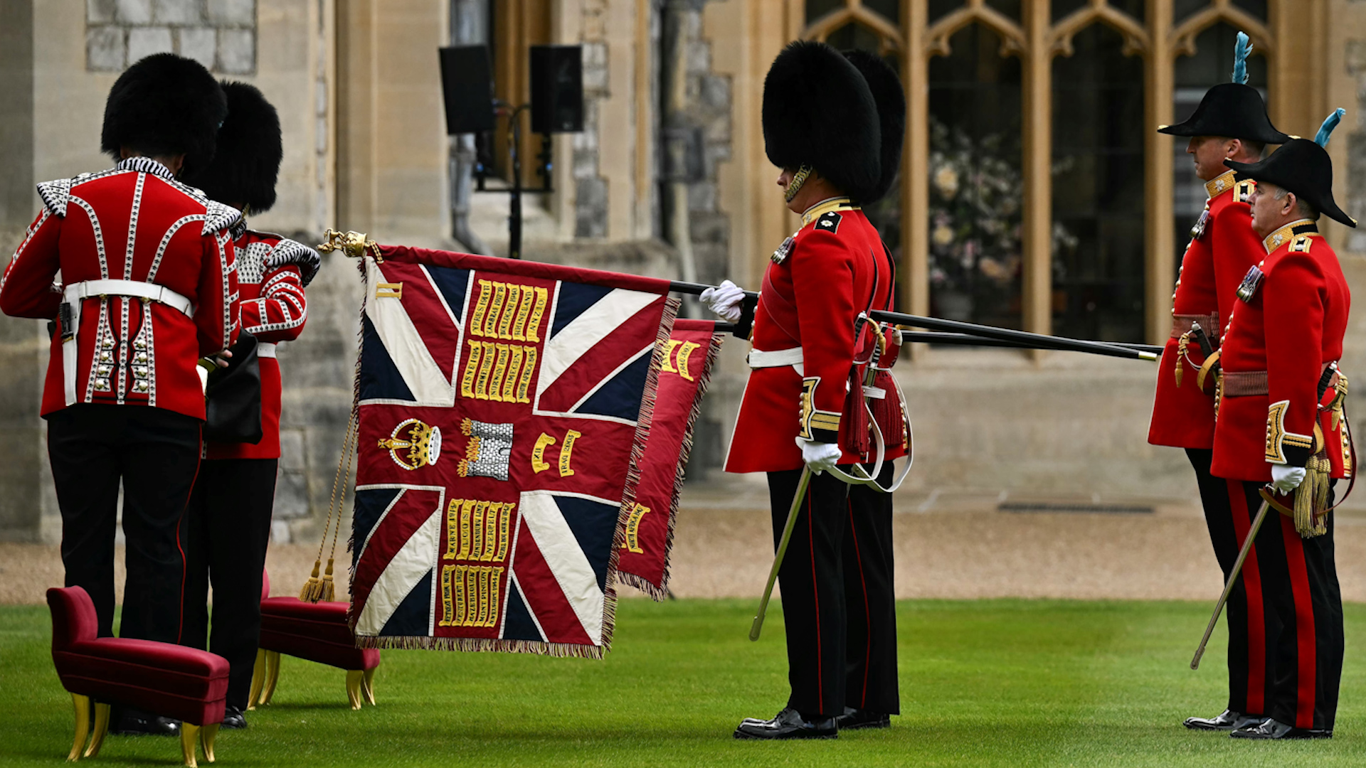 Soldiers from the Irish Guards holds the new colours, including The Regimental Colour during a ceremony for the presentation of new colours 10062024 NO REUSE CREDIT PA WIRE, PA IMAGES.jpg