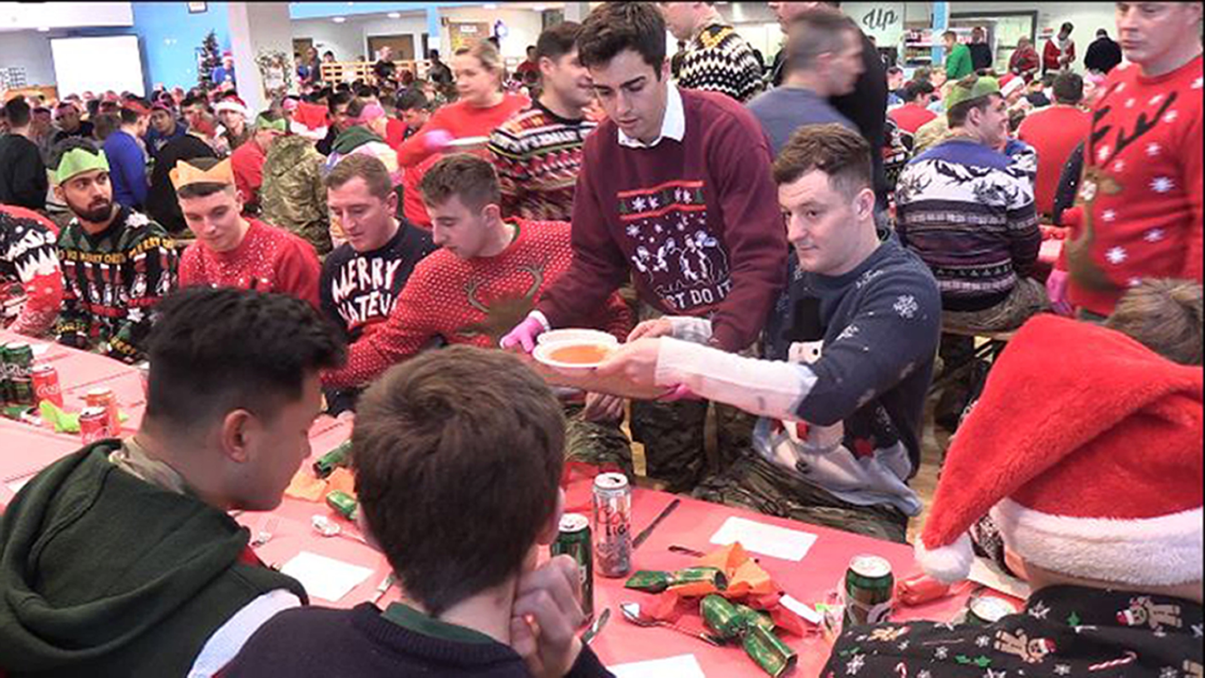 Enjoying Christmas lunch (Picture: PA).