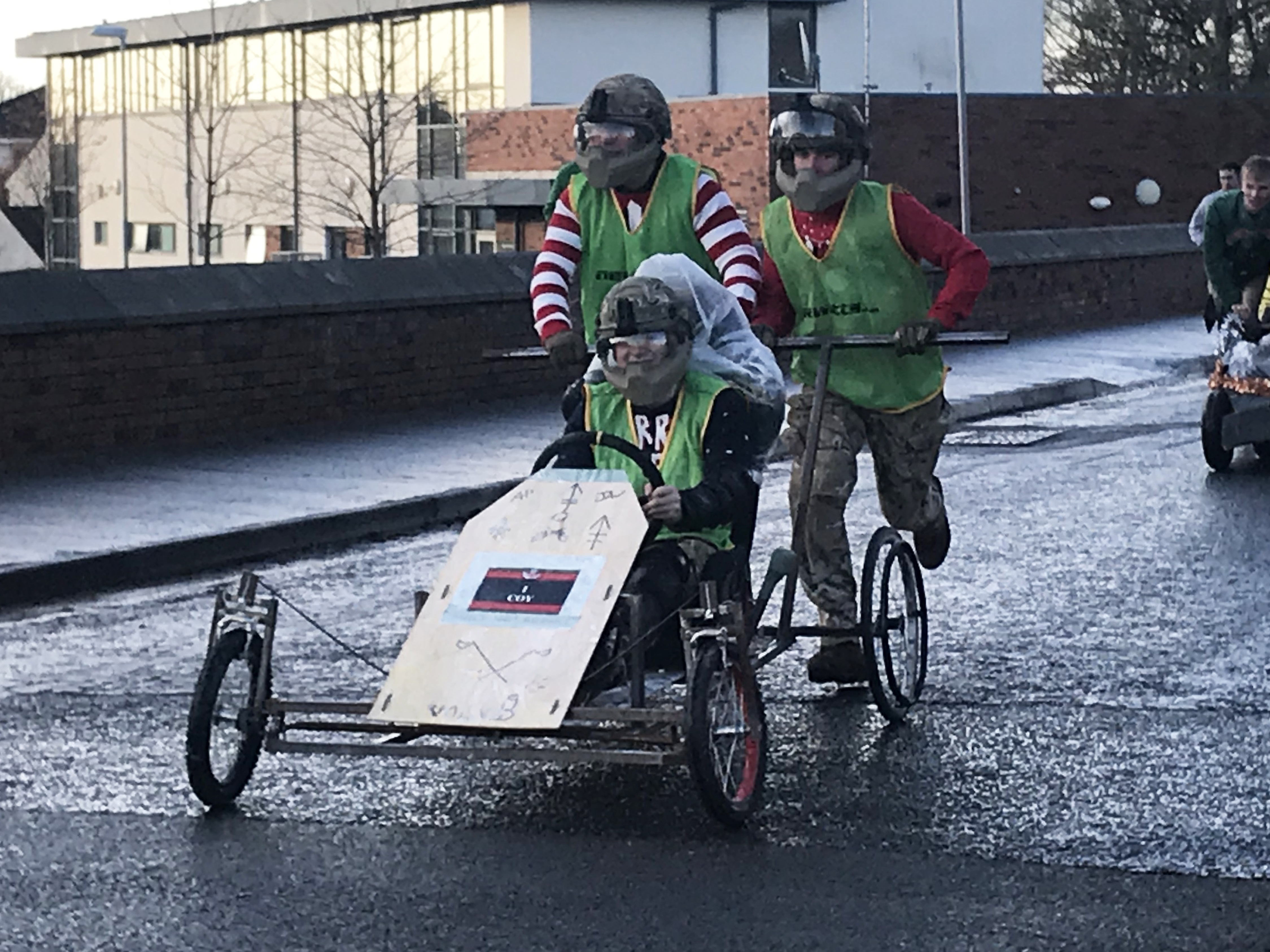 Cover image: Soldiers of 2 Rifles enjoy improvised sleigh races at Thiepval Barracks in Co Antrim (Picture: PA).