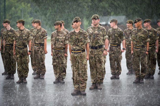 British Soldiers on parade in the rain at Sennelager, Germany