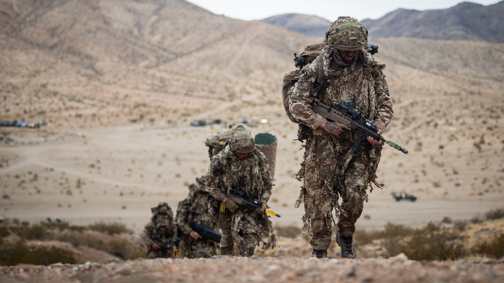 Members of 2 R Yorks' Recce Platoon patrol towards their OP
