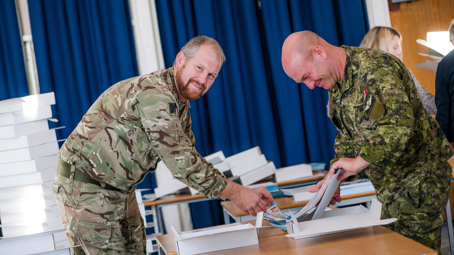 Soldiers help to pack Little Troopers boxes CREDIT Deborah Johnson