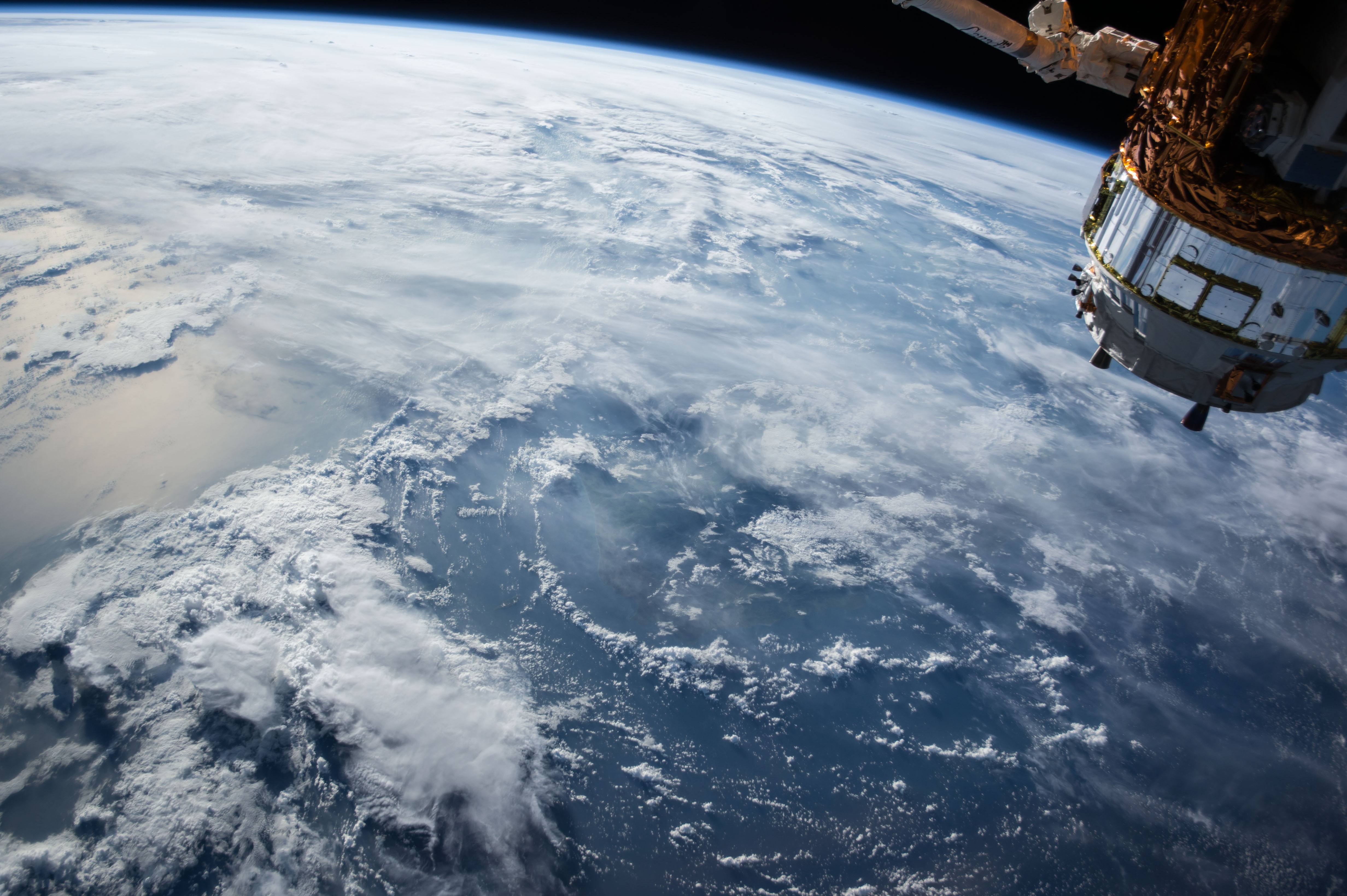 Space - view of the earth and a satellite from above earth (Picture: NASA).