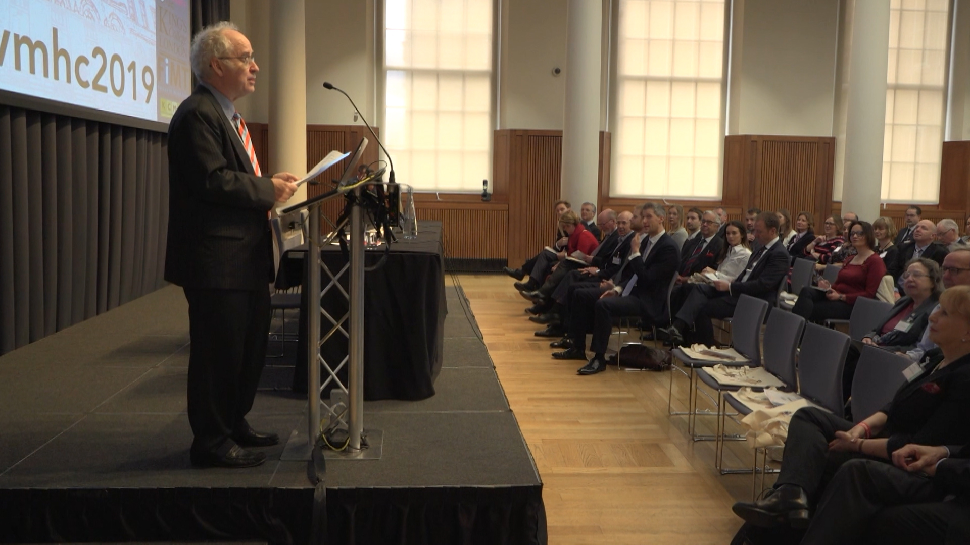 A speaker addresses guests at the Veterans Mental Health Conference in London