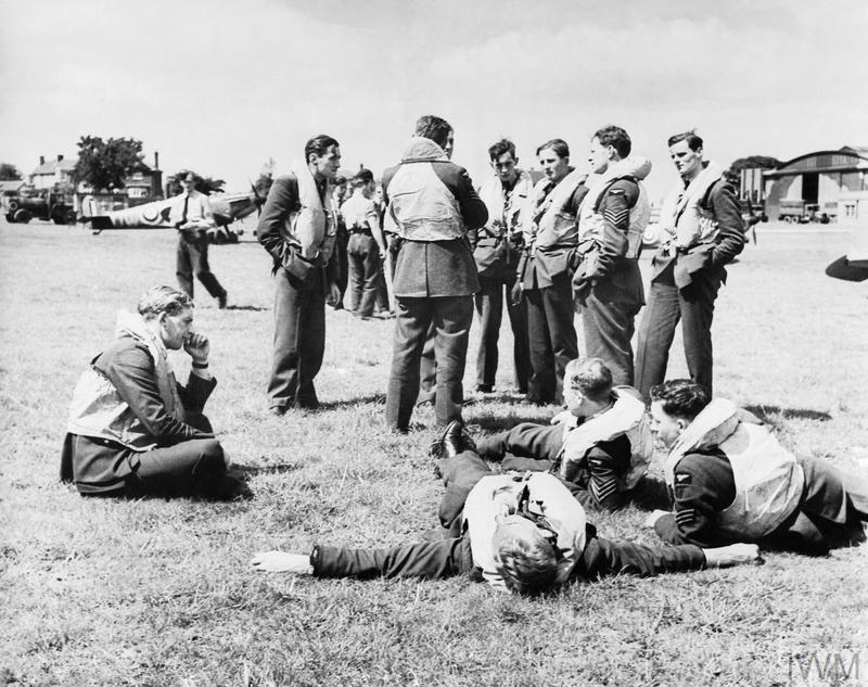 Spitfire pilots relax between sorties during World War Two (Picture: Imperial War Museum).