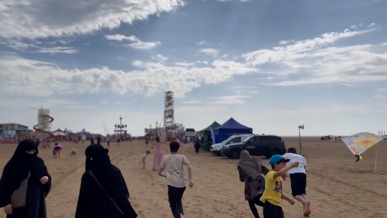 Families from Afghanistan enjoyed a day of flying kites; an activity banned by the Taliban, at St Anne's International Kite Flying Festival.